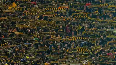 Borussia Dortmund e Benfica Reagem: Crise em Viagens e Suspensão na Champions League!