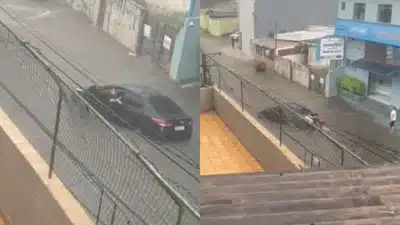 Mulher em Santo André Luta Contra Água e Danos ao Carro em Chuvas Fortes!