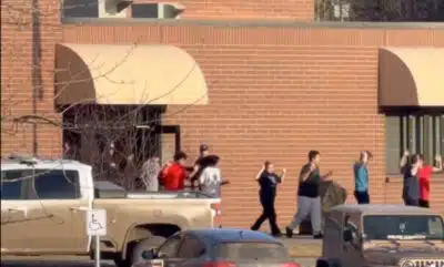 Tumbler Ridge em choque: Tiroteio na escola deixa dezenas de mortos e comunidade em luto!